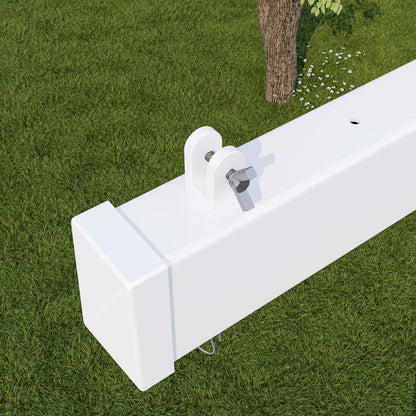 White metal bracket on a green grass background