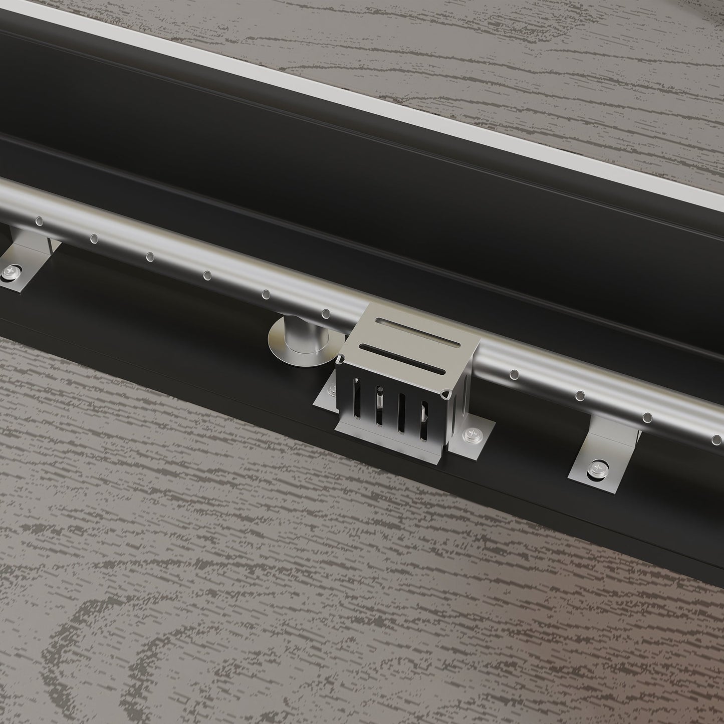 Metal track lighting fixture on a wooden surface