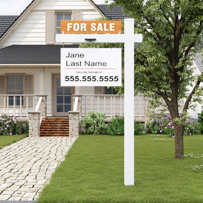 Real estate sign in front of a house