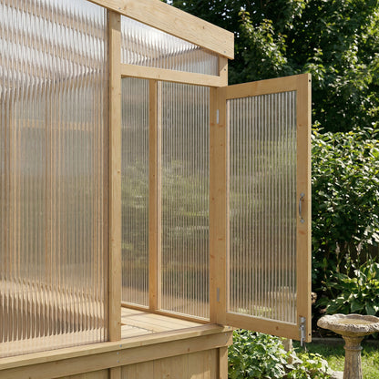 Wooden greenhouse with a transparent polycarbonate roof and walls, set against a natural background.