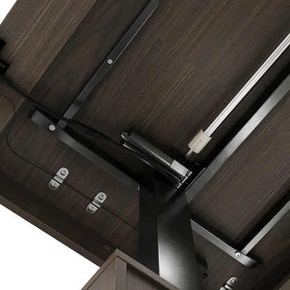 Dark wood standing desk with electric height adjustment and control panel