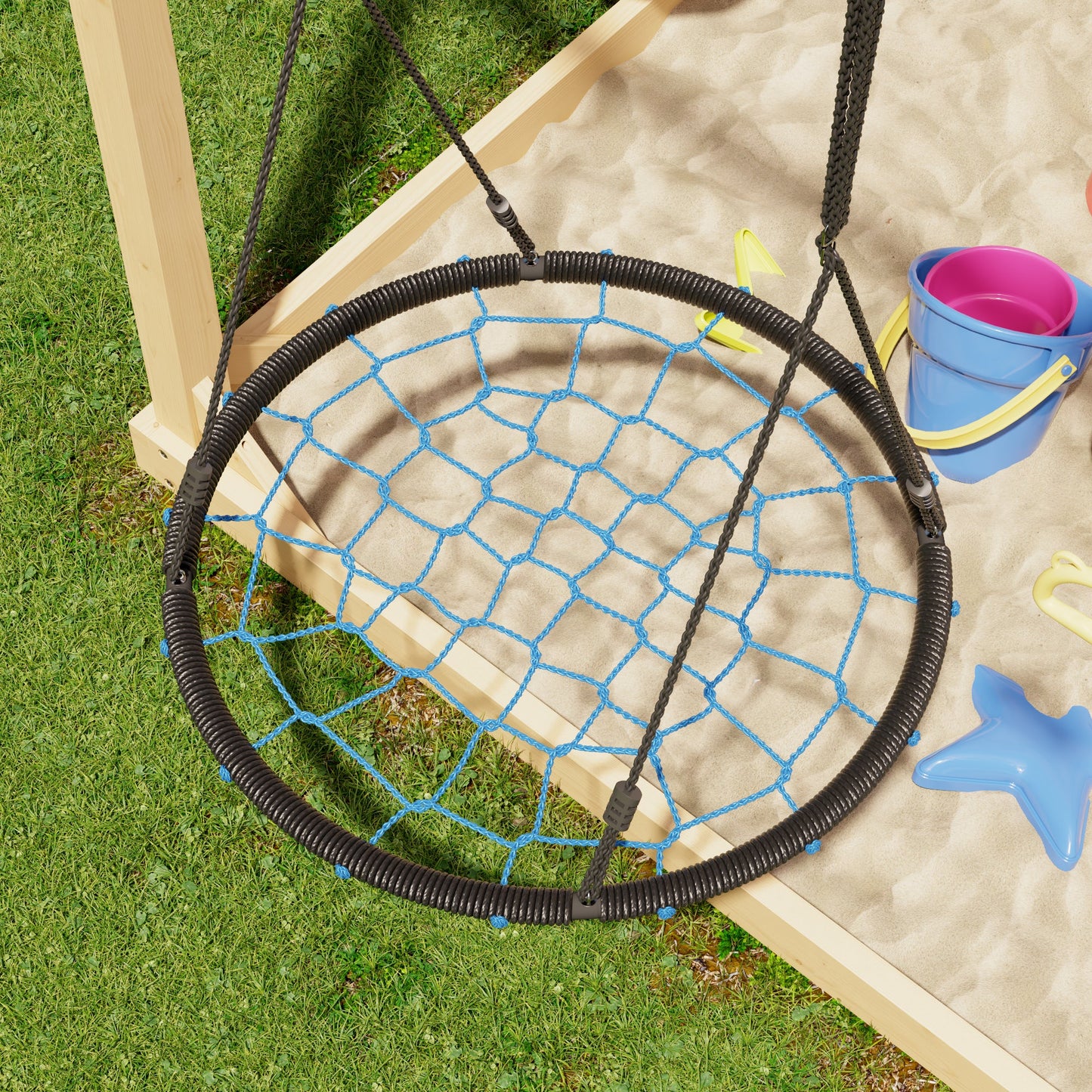 Children's swing with netting over a sandbox on grass
