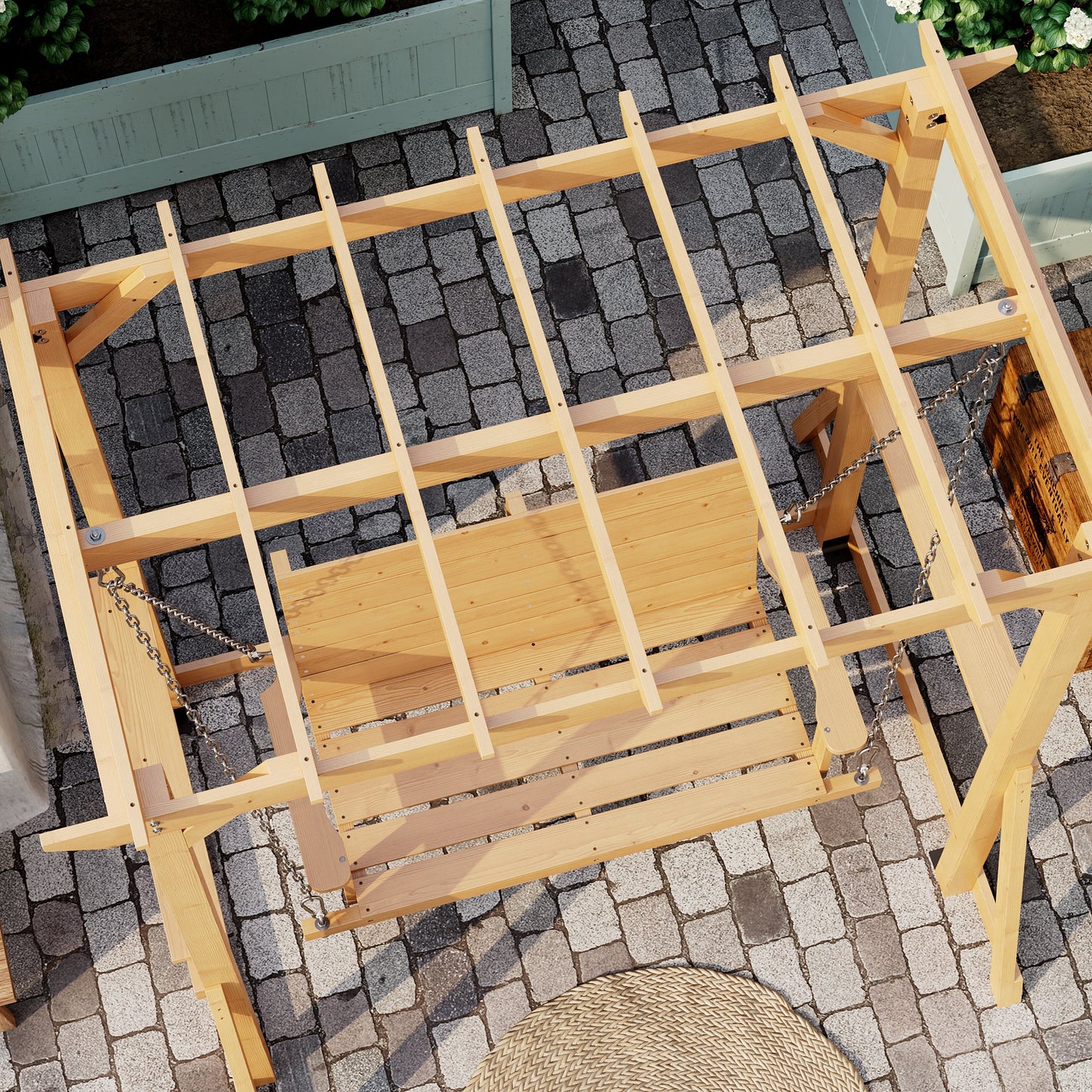 Wooden swing on a stone patio