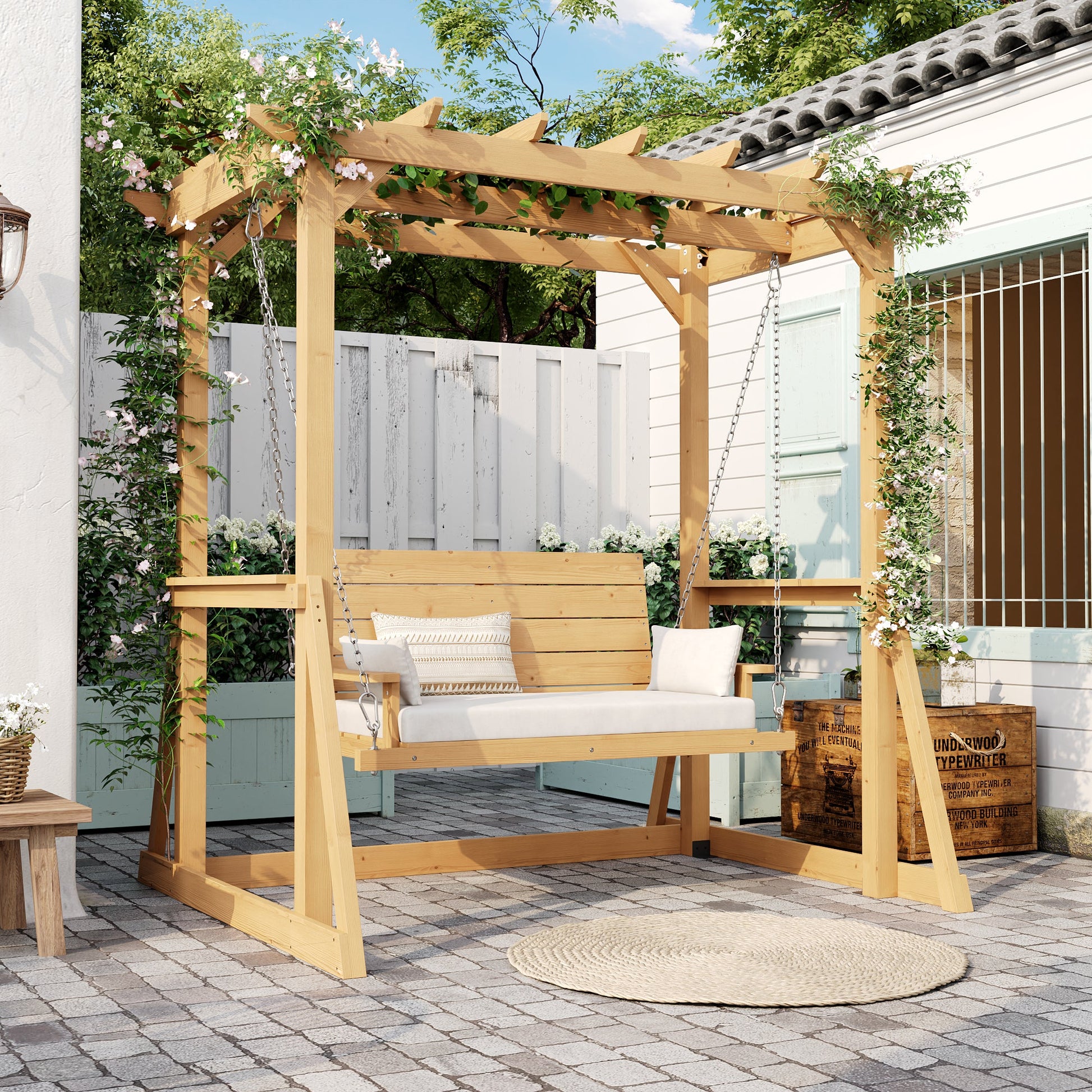 Wooden swing with a canopy in a garden setting
